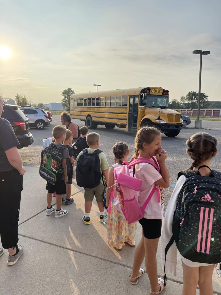 School Age kids waiting for the busA